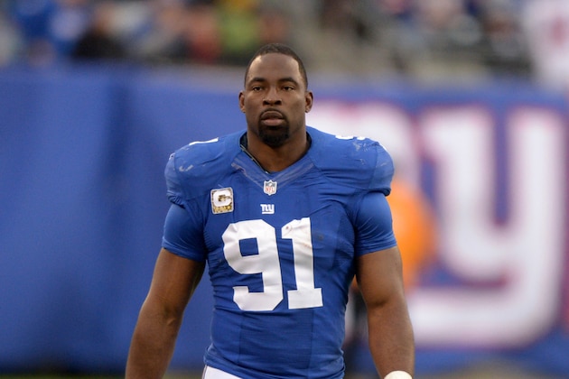 Nov 10, 2013; East Rutherford, NJ, USA; New York Giants defensive end Justin Tuck (91) during the game against the Oakland Raiders at MetLife Stadium. The Giants defeated the Raiders 24-20. Mandatory Credit: Kirby Lee-USA TODAY Sports
