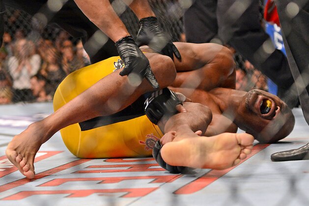 Dec 28, 2013; Las Vegas, NV, USA;    Anderson Silva reacts after breaking his leg on a kick to Chris Weidman (not pictured) during their UFC middleweight championship bout at the MGM Grand Garden Arena. Mandatory Credit: Jayne Kamin-Oncea-USA TODAY Sports