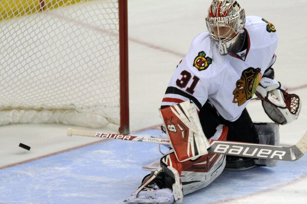 Chicago Blackhawks' goalie Antti Raanta (31), of Finland, watches the game-winning goal in a shootout by St. Louis Blues' Kevin Shattenkirk in an NHL hockey game Saturday, Dec. 28, 2013, in St. Louis. (AP Photo/Bill Boyce)