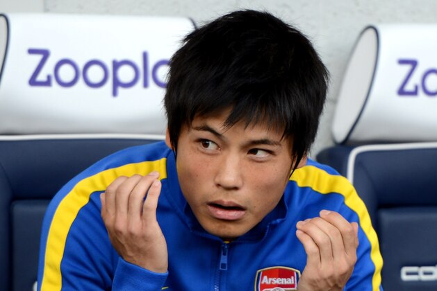WEST BROMWICH, ENGLAND - OCTOBER 06: Ryo Miyaichi of Arsenal looks on from the bench prior to the Barclays Premier League match between West Bromwich Albion and Arsenal at The Hawthorns on October 6, 2013 in West Bromwich, England. (Photo by Michael Regan/Getty Images) WEST BROMWICH, ENGLAND - OCTOBER 06: Ryo Miyaichi of Arsenal looks on from the bench prior to the Barclays Premier League match between West Bromwich Albion and Arsenal at The Hawthorns on October 6, 2013 in West Bromwich, England. (Photo by Michael Regan/Getty Images)
