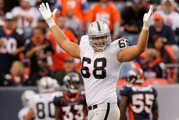 DENVER - OCTOBER 24:  Center Jared Veldheer #68 of the Oakland Raiders celebrates a touchdown by teammate Darren McFadden (not pictured) in the third quarter against the Denver Broncos at INVESCO Field at Mile High on October 24, 2010 in Denver, Colorado. The Raiders defeated the Broncos 59-14. (Photo by Justin Edmonds/Getty Images)