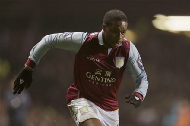 Aston Villa's Charles N'Zogbia is seen in action playing against Bradford City during their English League Cup second leg semi-final soccer match at Vill's stadium in Birmingham, England, Tuesday, Jan. 22,2013.(AP Photo/Alastair Grant)