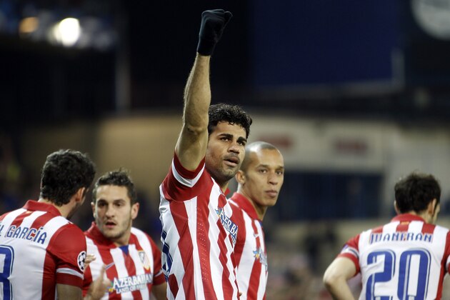 Atletico's Diego Costa celebrates scoring the opening goal during a Champions League, round of 16, second leg, soccer match between Atletico Madrid and AC Milan at the Vicente Calderon stadium in Madrid, Tuesday March 11, 2014. (AP Photo/Paul White) Atletico's Diego Costa celebrates scoring the opening goal during a Champions League, round of 16, second leg, soccer match between Atletico Madrid and AC Milan at the Vicente Calderon stadium in Madrid, Tuesday March 11, 2014. (AP Photo/Paul White)