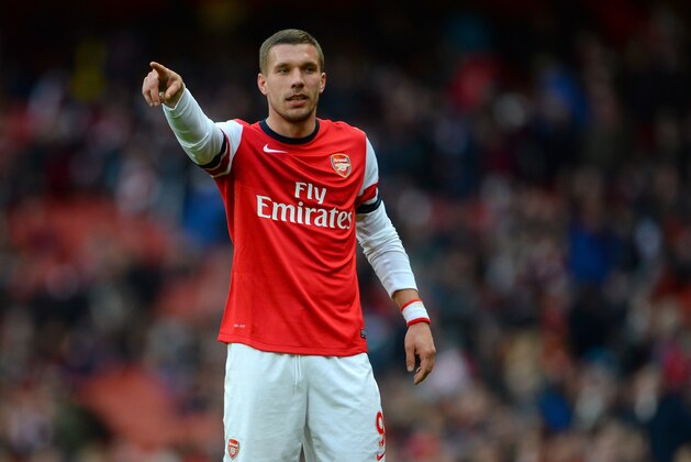 LONDON, ENGLAND - FEBRUARY 22:  Lukas Podolski of Arsenal gestures during the Barclays Premier League match between Arsenal and Sunderland at Emirates Stadium on February 22, 2014 in London, England.  (Photo by Michael Regan/Getty Images)