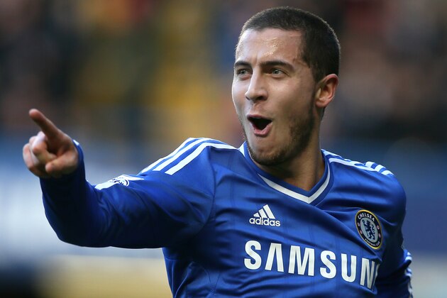 Chelsea's Eden Hazard celebrates after scoring  the opening goal against lNewcastle during their English Premier League soccer match between Chelsea and Newcastle United in London Saturday, Feb. 8, 2014. (AP Photo/Alastair Grant)