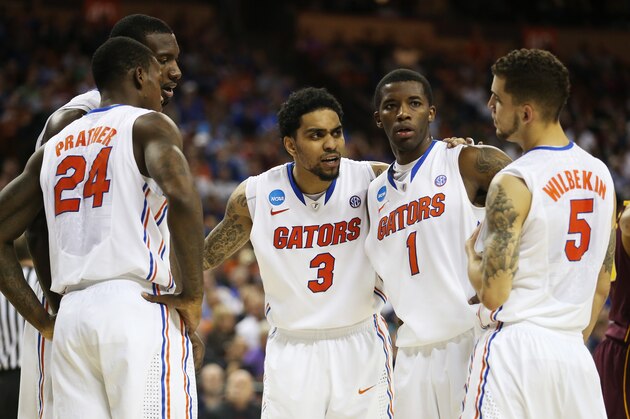 AUSTIN, TX - MARCH 24:  Mike Rosario #3 talks to Casey Prather #24, Patric Young #4, Kenny Boynton #1 and Scottie Wilbekin #5 of the Florida Gators in the second half against the Minnesota Golden Gophers during the third round of the 2013 NCAA Men's Basketball Tournament at The Frank Erwin Center on March 24, 2013 in Austin, Texas.  (Photo by Ronald Martinez/Getty Images)