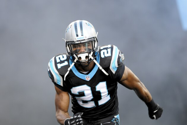 Carolina Panthers free safety Mike Mitchell (21) runs on the the field during player introductions before the start of an NFL football game  in Charlotte, NC, Sunday, Dec. 15, 2013. (AP Photo / Mike McCarn)