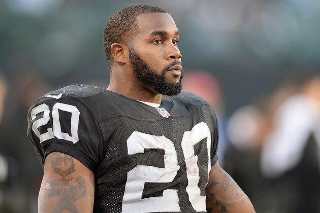 OAKLAND, CA - DECEMBER 29:  Darren McFadden #20 of the Oakland Raiders looks on from the sidelines against the Denver Broncos during the fourth quarter at O.co Coliseum on December 29, 2013 in Oakland, California. The Broncos won the game 34-14.  (Photo by Thearon W. Henderson/Getty Images)