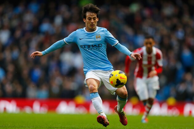 MANCHESTER, ENGLAND - FEBRUARY 22:  David Silva of Manchester City in action during the Barclays Premier League match between Manchester City and Stoke City at the Etihad Stadium on February 22, 2014 in Manchester, England.  (Photo by Paul Thomas/Getty Images)