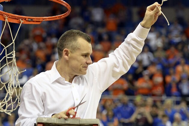 Florida coach Billy Donovan holds up a piece of the net after the Gators became the first team in Southeastern Conference history to go 18-0 in league pla, Saturday, March 8, 2014 in Gainesville, Fla. Florida defeated Kentucky 84-65 Saturday in an NCAA college basketball game. (AP Photo/Phil Sandlin) Florida coach Billy Donovan holds up a piece of the net after the Gators became the first team in Southeastern Conference history to go 18-0 in league pla, Saturday, March 8, 2014 in Gainesville, Fla. Florida defeated Kentucky 84-65 Saturday in an NCAA college basketball game. (AP Photo/Phil Sandlin)