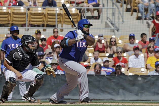 Texas Rangers' Prince Fielder bats against the Chicago White Sox in a spring exhibition baseball game Tuesday, March 11, 2014, in Glendale, Ariz. (AP Photo/Mark Duncan)