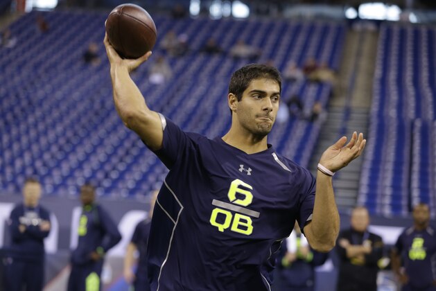 Eastern Illinois quarterback Jimmy Garoppolo throws during a drill at the NFL football scouting combine in Indianapolis, Sunday, Feb. 23, 2014. (AP Photo/Michael Conroy)