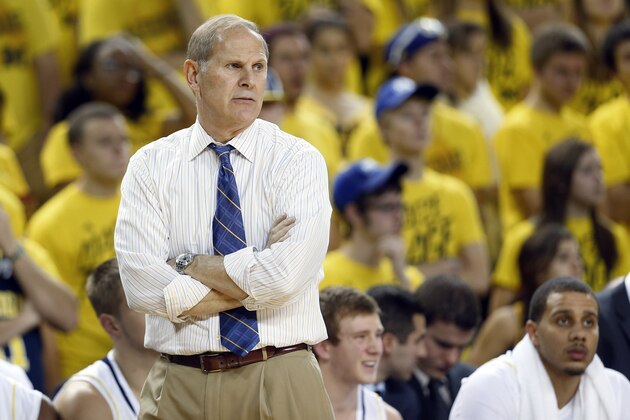 Michigan Wolverines head coach John Beilein watches against Wayne State in the second half of an exhibition NCAA basketball game in Ann Arbor, Mich., Monday, Nov. 4, 2013. (AP Photo/Paul Sancya)