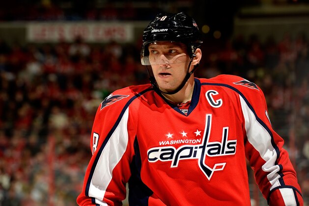 WASHINGTON, DC - MARCH 08:  Alex Ovechkin #8 of the Washington Capitals reacts before a face-off in the second period during an NHL game against the Phoenix Coyotes at Verizon Center on March 8, 2014 in Washington, DC.  (Photo by Patrick McDermott/NHLI via Getty Images)