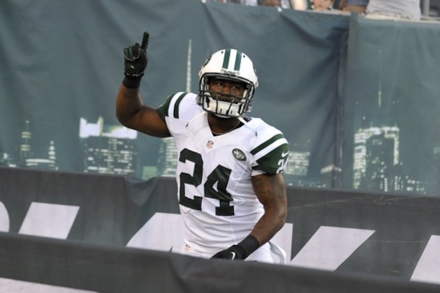 New York Jets defensive back Darrelle Revis runs on the field before a preseason NFL football game between the New York Jets and the New York Giants Saturday, Aug. 18, 2012, in East Rutherford, N.J.  (AP Photo/Bill Kostroun)