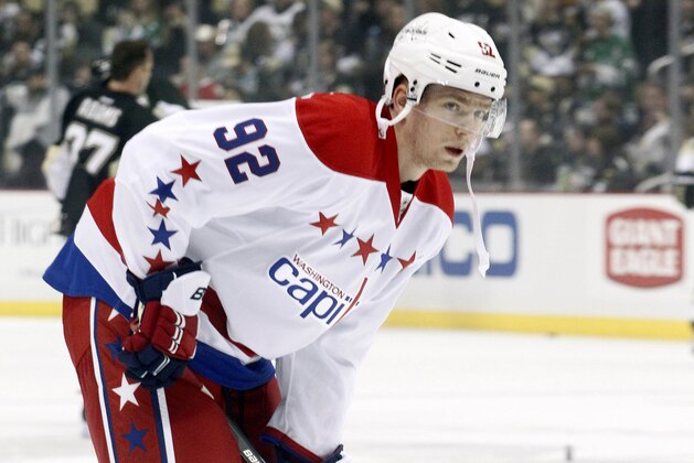 Mar 11, 2014; Pittsburgh, PA, USA; Washington Capitals center Evgeny Kuznetsov (92) on the ice before playing the Pittsburgh Penguins at the CONSOL Energy Center. Mandatory Credit: Charles LeClaire-USA TODAY Sports