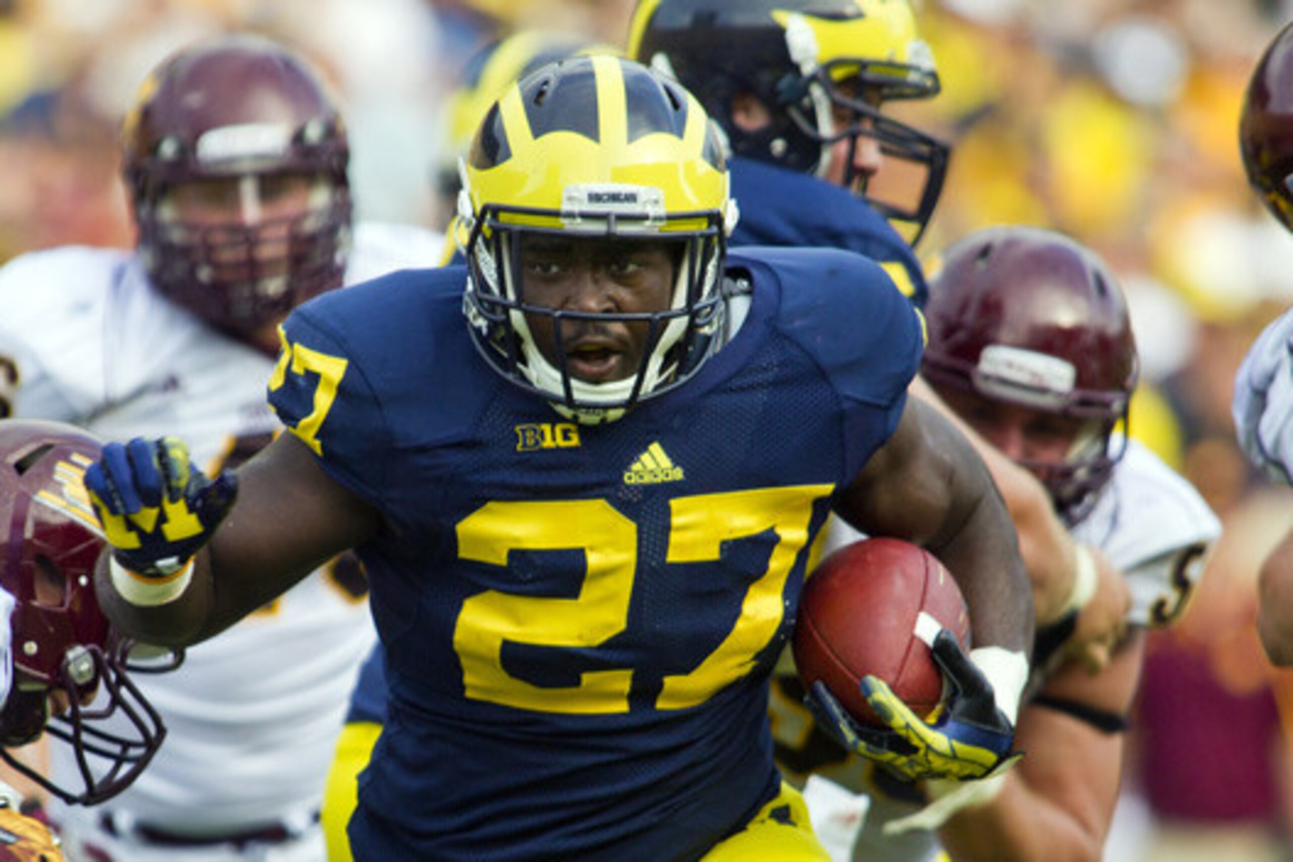 Michigan running back Derrick Green (27) rushes through the Central Michigan defense during the third quarter of an NCAA college football game, Saturday, Aug. 31, 2013, in Ann Arbor, Mich. Michigan won 59-9. (AP Photo/Tony Ding) Michigan running back Derrick Green (27) rushes through the Central Michigan defense during the third quarter of an NCAA college football game, Saturday, Aug. 31, 2013, in Ann Arbor, Mich. Michigan won 59-9. (AP Photo/Tony Ding)