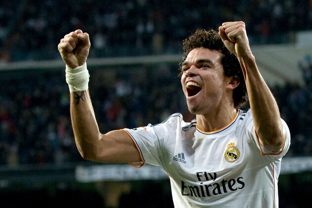 MADRID, SPAIN - FEBRUARY 05:  Pepe of Real Madrid CF celebrates Jese Rodriguez's goal during the Copa del Rey semifinal first leg match between Real Madrid CF and Club Atletico Madrid at Estadio Santiago Bernabeu on February 5, 2014 in Madrid, Spain.  (Photo by Gonzalo Arroyo Moreno/Getty Images)