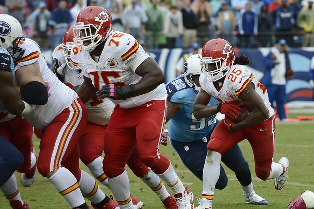 Kansas City Chiefs running back Jamaal Charles (25) follows the block of tackle Branden Albert (76) to score a touchdown against the Tennessee Titans on a 1-yard run in the fourth quarter of an NFL football game on Sunday, Oct. 6, 2013, in Nashville, Tenn. (AP Photo/Mark Zaleski)