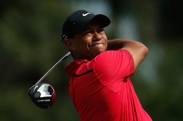 DORAL, FL - MARCH 09:  Tiger Woods hits his tee shot on the seventh hole during the final round of the World Golf Championships-Cadillac Championship at Trump National Doral on March 9, 2014 in Doral, Florida.  (Photo by Chris Trotman/Getty Images)