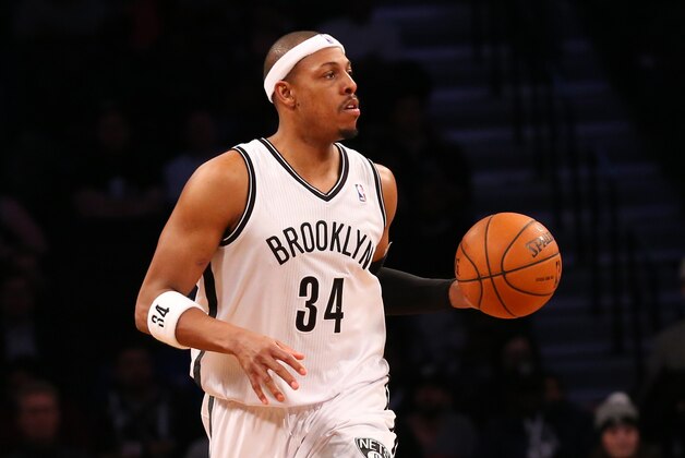 Feb 12, 2014; Brooklyn, NY, USA;   Brooklyn Nets small forward Paul Pierce (34) advances the ball during the third quarter against the Charlotte Bobcats at Barclays Center. Brooklyn Nets won 105-89. Mandatory Credit: Anthony Gruppuso-USA TODAY Sports
