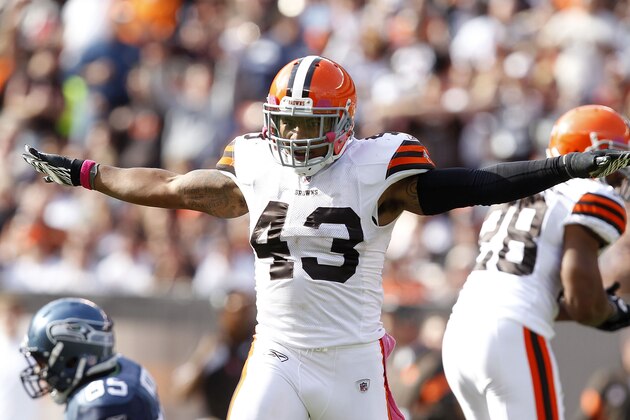 CLEVELAND, OH - OCTOBER 23:  Defensive back T.J. Ward #43 of the Cleveland Browns celebrates after an interception against the Seattle Seahawks at Cleveland Browns Stadium on October 23, 2011 in Cleveland, Ohio.  (Photo by Matt Sullivan/Getty Images)
