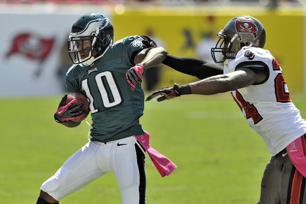 Philadelphia Eagles wide receiver DeSean Jackson (10) is shoved out of bounds by Tampa Bay Buccaneers cornerback Darrelle Revis (24) during the second quarter of an NFL football game Sunday, Oct. 13, 2013, in Tampa, Fla. (AP Photo/Steve Nesius) Philadelphia Eagles wide receiver DeSean Jackson (10) is shoved out of bounds by Tampa Bay Buccaneers cornerback Darrelle Revis (24) during the second quarter of an NFL football game Sunday, Oct. 13, 2013, in Tampa, Fla. (AP Photo/Steve Nesius)