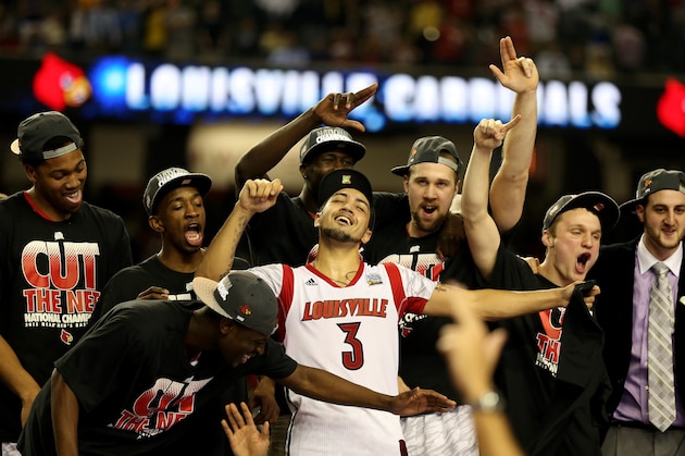 ATLANTA, GA - APRIL 08: Peyton Siva (C) #3 and RUss Smith #2 (L of Siva) of the Louisville Cardinals celebrate with teammates after they defeated the Michigan Wolverines during the 2013 NCAA Men's Final Four Championship at the Georgia Dome on April 8, 2013 in Atlanta, Georgia. (Photo by Andy Lyons/Getty Images) ATLANTA, GA - APRIL 08: Peyton Siva (C) #3 and RUss Smith #2 (L of Siva) of the Louisville Cardinals celebrate with teammates after they defeated the Michigan Wolverines during the 2013 NCAA Men's Final Four Championship at the Georgia Dome on April 8, 2013 in Atlanta, Georgia. (Photo by Andy Lyons/Getty Images)