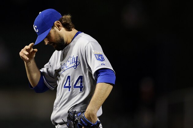 Kansas City Royals relief pitcher Luke Hochevar pauses after allowing Baltimore Orioles' Adam Jones to score on a double by Matt Wieters in the eighth inning of a baseball game in Baltimore, Tuesday, May 7, 2013. Baltimore won 4-3. (AP Photo/Patrick Semansky)