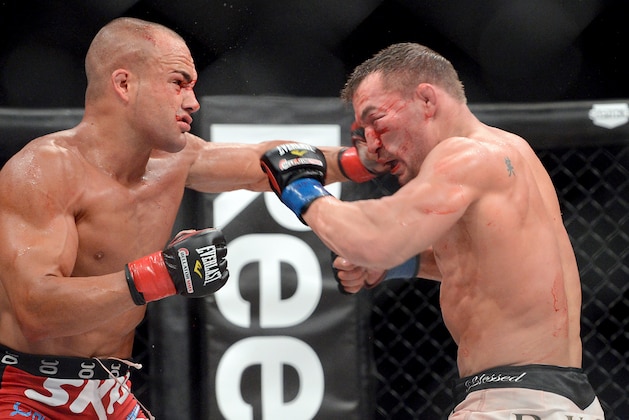 Nov 2, 2013; Long Beach, CA, USA;   Eddie Alvarez (red gloves ) and Michael Chandler (blue gloves) during their Bellator Lightweight World Championship fight at the Long Beach Arena. Alvarez won the fight. Mandatory Credit: Jayne Kamin-Oncea-USA TODAY Sports