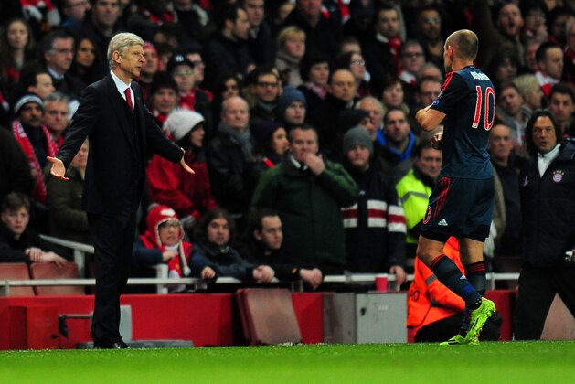 LONDON, ENGLAND - FEBRUARY 19: Arsene Wenger manager of Arsenal appeals to Arjen Robben of Bayern Muenchen during the UEFA Champions League Round of 16 first leg match between Arsenal and FC Bayern Muenchen at Emirates Stadium on February 19, 2014 in London, England. (Photo by Shaun Botterill/Getty Images) LONDON, ENGLAND - FEBRUARY 19: Arsene Wenger manager of Arsenal appeals to Arjen Robben of Bayern Muenchen during the UEFA Champions League Round of 16 first leg match between Arsenal and FC Bayern Muenchen at Emirates Stadium on February 19, 2014 in London, England. (Photo by Shaun Botterill/Getty Images)