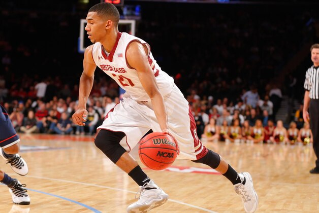 Nov 21, 2013; New York, NY, USA;  Boston College Eagles guard Olivier Hanlan (21) drives to the basket during the first half against the Connecticut Huskies at Madison Square Garden. Mandatory Credit: Jim O'Connor-USA TODAY Sports