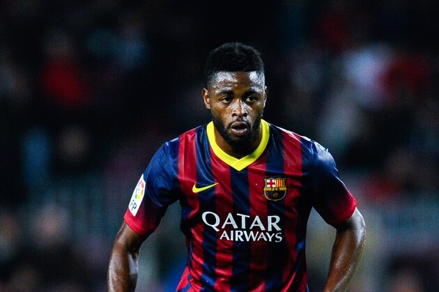 BARCELONA, SPAIN - DECEMBER 17:  Alex Song of FC Barcelona runs with the ball during the Copa del Rey round of 32 second leg match between FC Barcelona and Cartagena at Camp Nou on December 17, 2013 in Barcelona, Spain.  (Photo by David Ramos/Getty Images)
