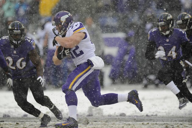 Minnesota Vikings running back Toby Gerhart (32) rushes the ball during an NFL football game against the Baltimore Ravens, Sunday, Dec. 8, 2013, in Baltimore. (AP Photo/Nick Wass)