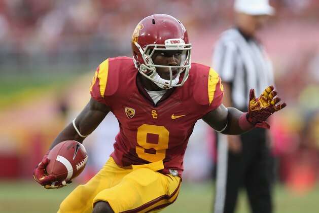 LOS ANGELES, CA - OCTOBER 20: Wide receiver Marqise Lee #9 of the USC Trojans carries the ball against the Colorado Buffaloes at Los Angeles Memorial Coliseum on October 20, 2012 in Los Angeles, California. (Photo by Jeff Gross/Getty Images) LOS ANGELES, CA - OCTOBER 20: Wide receiver Marqise Lee #9 of the USC Trojans carries the ball against the Colorado Buffaloes at Los Angeles Memorial Coliseum on October 20, 2012 in Los Angeles, California. (Photo by Jeff Gross/Getty Images)