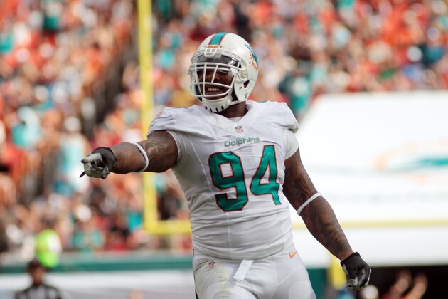 Miami Dolphins defensive tackle Randy Starks (94) gestures on the field during the first half of an NFL football game, Sunday, Nov. 24, 2013, in Miami Gardens, Fla. (AP Photo/J Pat Carter   Carter  STF    AP)