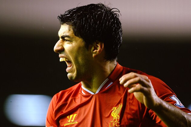 LIVERPOOL, ENGLAND - JANUARY 28:  Luis Suarez of Liverpool reacts during the Barclays Premier League match between Liverpool and Everton at Anfield on January 28, 2014 in Liverpool, England.  (Photo by Laurence Griffiths/Getty Images)