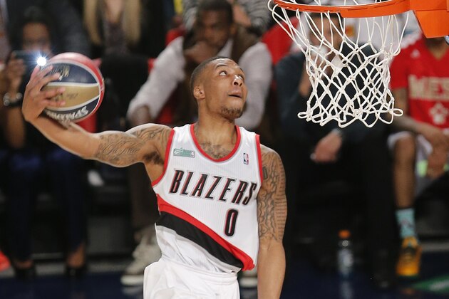 In this photo taken Saturday, Feb. 15, 2014, Portland Blazers' Damian Lillard competes in the slam dunk contest during the skills competition at the NBA All Star basketball game in New Orleans. Portland guard Damian Lillard became the first player to participate in all five competitions during the NBA All-Star weekend. The Trail Blazers guard participated in Friday’s rising stars games between first- and second-year players, Saturday’s three skill competitions and Sunday’s All-Star game. (AP Photo/Bill Haber)