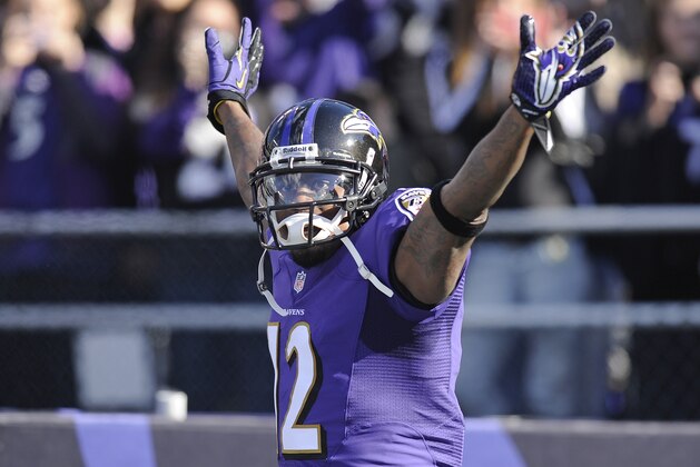 Baltimore Ravens wide receiver Jacoby Jones waves as he introduced before a NFL football game against the Cincinnati Bengals in Baltimore, Sunday, Nov. 10, 2013. (AP Photo/Nick Wass)