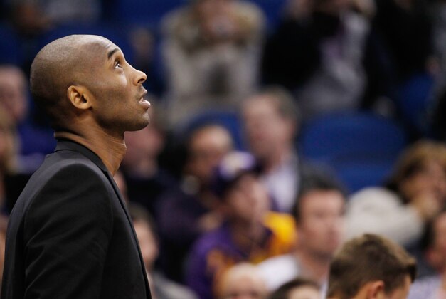 Jan 24, 2014; Orlando, FL, USA; Los Angeles Lakers shooting guard Kobe Bryant (24) against the Orlando Magic during the second quarter at Amway Center. Mandatory Credit: Kim Klement-USA TODAY Sportsw