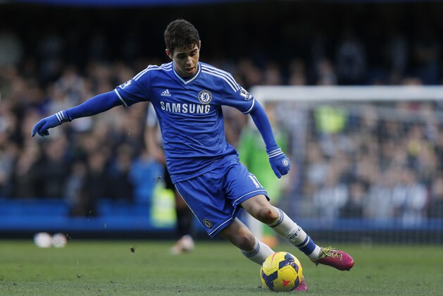 Chelsea's Oscar plays against Newcastle United during their English Premier League soccer match at Stamford Bridge, London, Saturday, Feb. 8, 2014. (AP Photo/Sang Tan)