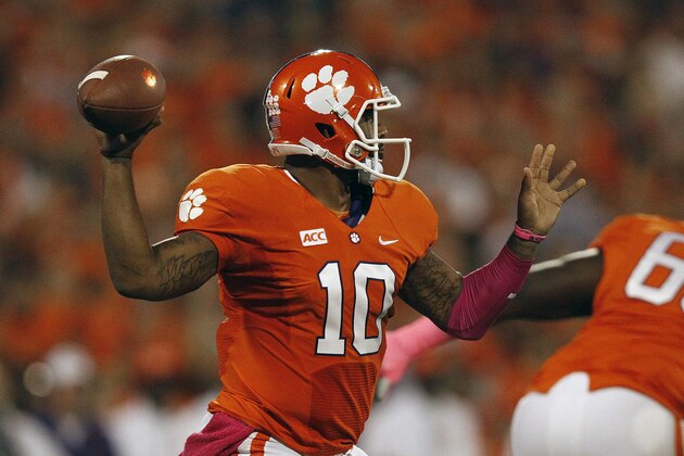 Clemson quarterback Tajh Boyd (10) works against the Florida State during the first half of an NCAA college football game, Saturday, Oct. 19, 2013, in Clemson, S.C. (AP Photo/Mike Stewart) Clemson quarterback Tajh Boyd (10) works against the Florida State during the first half of an NCAA college football game, Saturday, Oct. 19, 2013, in Clemson, S.C. (AP Photo/Mike Stewart)