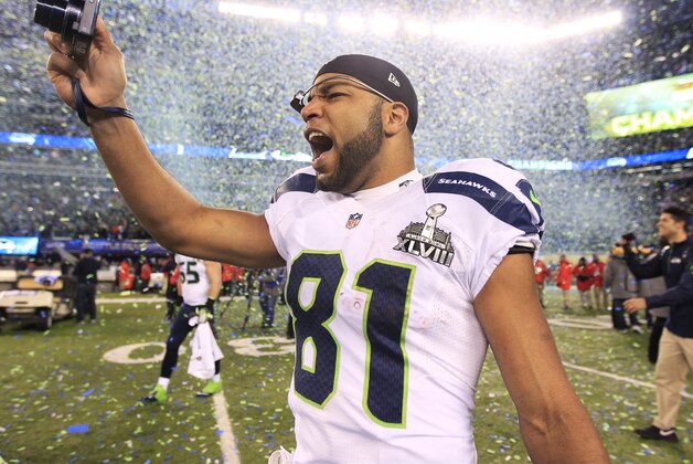 Seattle Seahawks' Golden Tate celebrates after the NFL Super Bowl XLVIII football game against the Denver Broncos Sunday, Feb. 2, 2014, in East Rutherford, N.J. The Seahawks won 43-8. (AP Photo/Jeff Roberson)