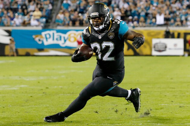 JACKSONVILLE, FL - DECEMBER 05:   Maurice Jones-Drew #32 of the Jacksonville Jaguars rushes for yardage during the game against the Houston Texans at EverBank Field on December 5, 2013 in Jacksonville, Florida.  (Photo by Sam Greenwood/Getty Images)