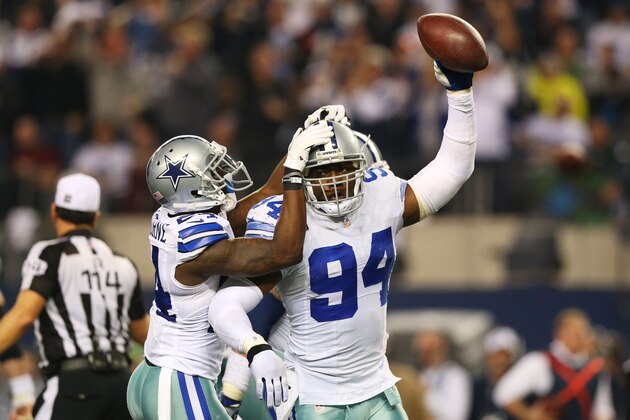 ARLINGTON, TX - DECEMBER 29:  DeMarcus Ware #94 and Morris Claiborne #24 of the Dallas Cowboys celebrate in the second half against the Philadelphia Eagles at Cowboys Stadium on December 29, 2013 in Arlington, Texas.  (Photo by Ronald Martinez/Getty Images)