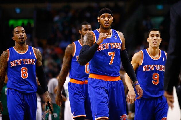 BOSTON, MA - MARCH 12: Carmelo Anthony #7 of the New York Knicks reacts following a timeout in the first quarter against the Boston Celtics during the game at TD Garden on March 12, 2014 in Boston, Massachusetts. NOTE TO USER: User expressly acknowledges and agrees that, by downloading and or using this photograph, User is consenting to the terms and conditions of the Getty Images License Agreement.  (Photo by Jared Wickerham/Getty Images)