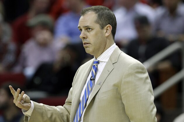 Indiana Pacers coach Frank Vogel calls a play against the Houston Rockets in the first half of an NBA basketball game Friday, March 7, 2014, in Houston. (AP Photo/Pat Sullivan)