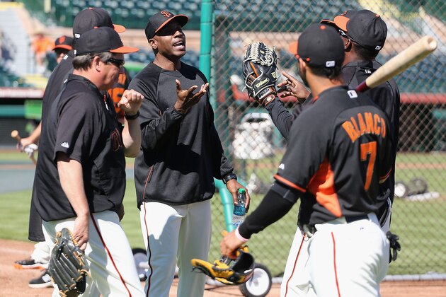 SCOTTSDALE, AZ - MARCH 10: Barry Bonds (C) of the San Francisco Giants speaks with team coaches as a special hitting coach for one week of Spring Training during batting practice at Scottsdale Stadium on March 10, 2014 in Scottsdale, Arizona. (Photo by Christian Petersen/Getty Images) SCOTTSDALE, AZ - MARCH 10: Barry Bonds (C) of the San Francisco Giants speaks with team coaches as a special hitting coach for one week of Spring Training during batting practice at Scottsdale Stadium on March 10, 2014 in Scottsdale, Arizona. (Photo by Christian Petersen/Getty Images)