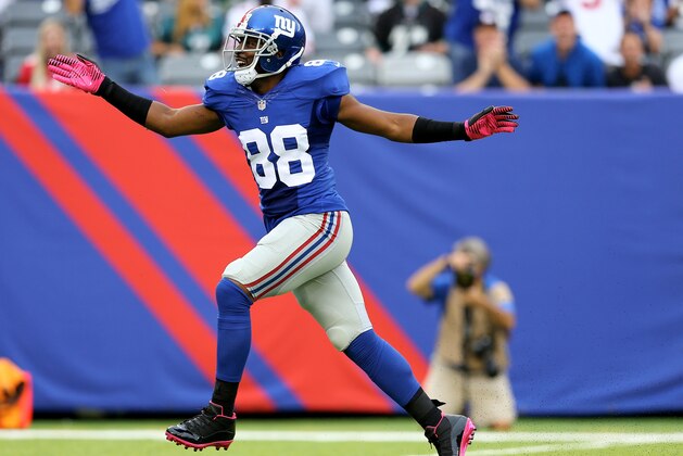 EAST RUTHERFORD, NJ - OCTOBER 06:  Hakeem Nicks #88 of the New York Giants celebrates his first down catch in the first quarter against the Philadelphia Eagles at MetLife Stadium on October 6, 2013 in East Rutherford, New Jersey.  (Photo by Elsa/Getty Images)