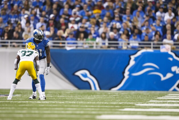 Detroit Lions wide receiver Calvin Johnson (81) is defended by Green Bay Packers cornerback Sam Shields (37) during an NFL football game at Ford Field in Detroit, Thursday, Nov. 28, 2013. (AP Photo/Rick Osentoski)